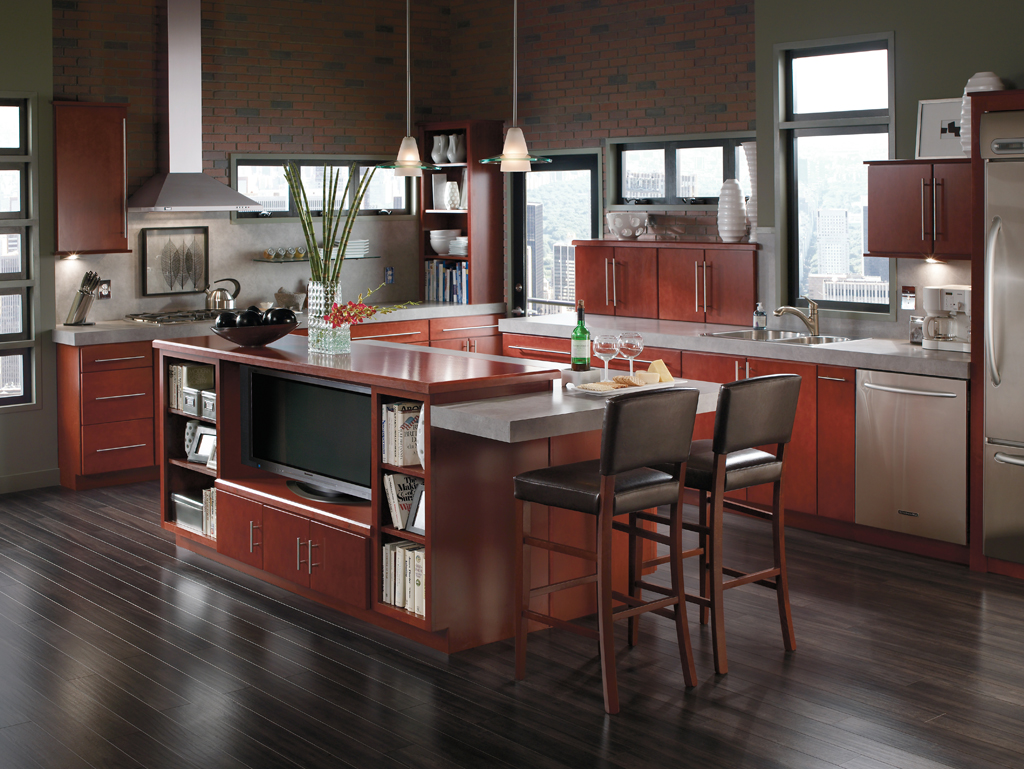 Kitchenland - Open kitchen concept with dark wood floors and cherry wood cabinets